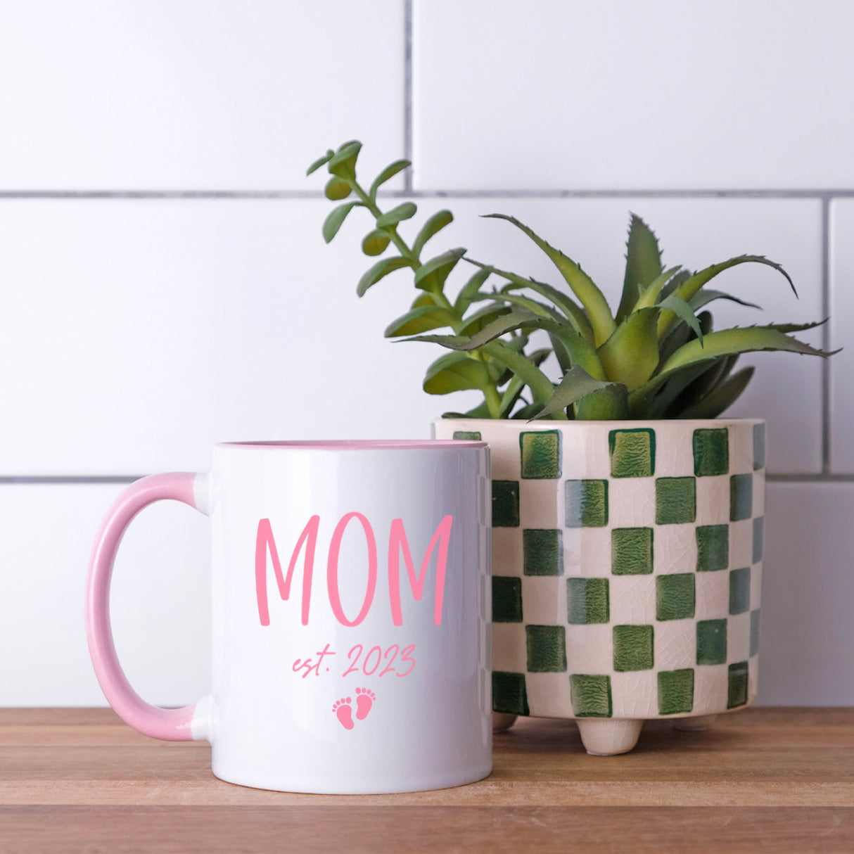 Cute personalized mug with baby footprints and custom text, a heartfelt gift for baby showers or first-time moms.