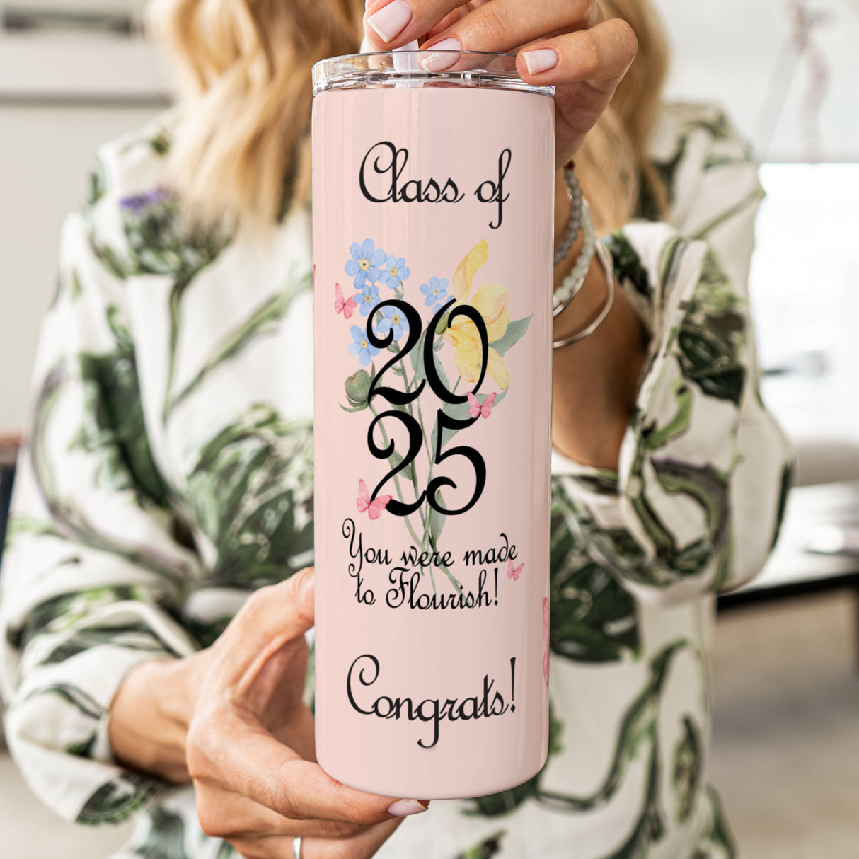 This Floral Coquette Graduation Tumbler with a sophisticated floral design is an ideal gift for female graduates in the Class of 2025.