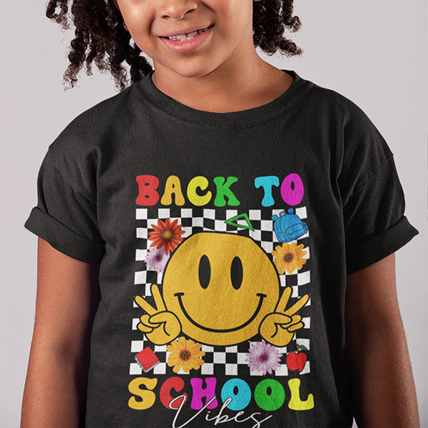Great first day of school picture shirt with the words Back to School Vibes. Take the perfect picture of your elementary student on the start of the new school year. all SKUs