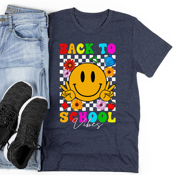 1st Day of school outfit tshirt that can be paire with jeans, shorts, tights and more. It has a smiley face design. all SKUs