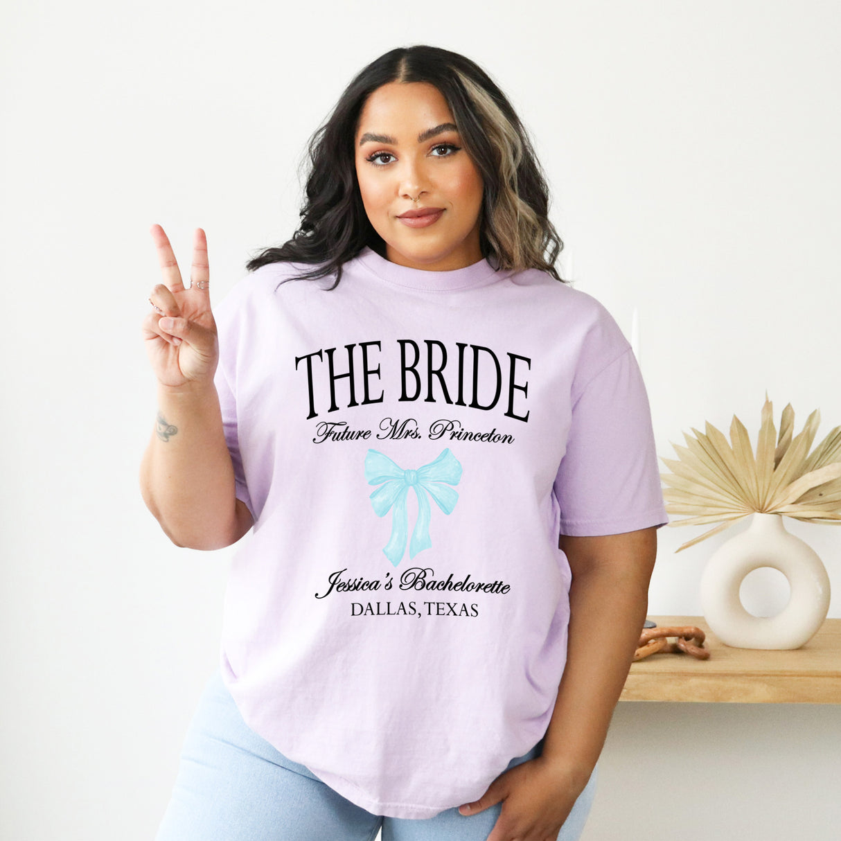 Custom Comfort Colors bride to be t-shirts with She’s Tying The Knot, perfect gifts for bachelorette weekends and bridal parties.