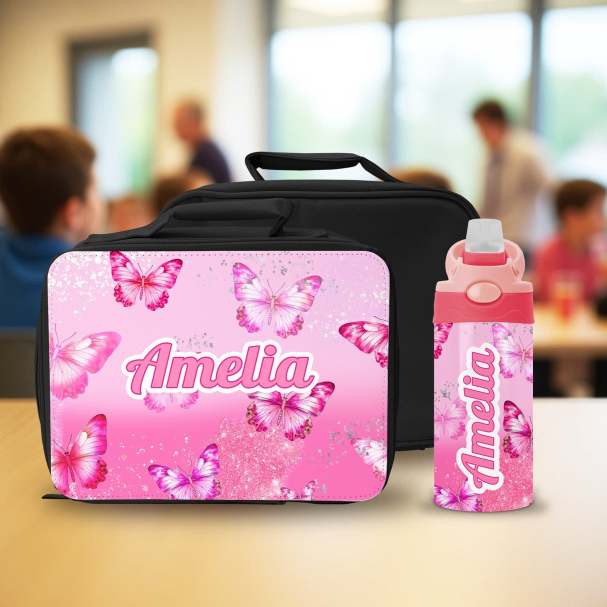 Durable personalized lunch box and matching water bottle for kids, custom lunch box with name and butterfly design.