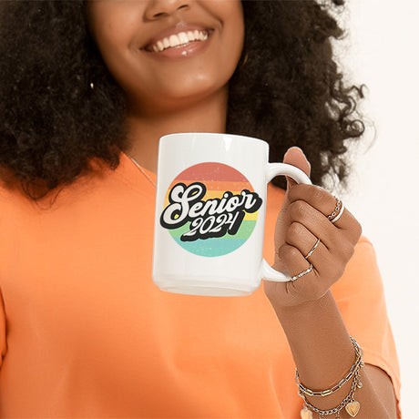 Woman holding senior 2024 graduation coffee mug. All SKUs.