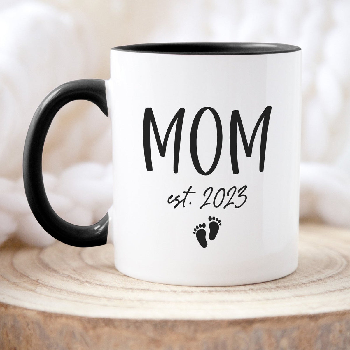 Personalized baby feet coffee mug with sentimental design, a thoughtful gift for expecting mothers or new parents.