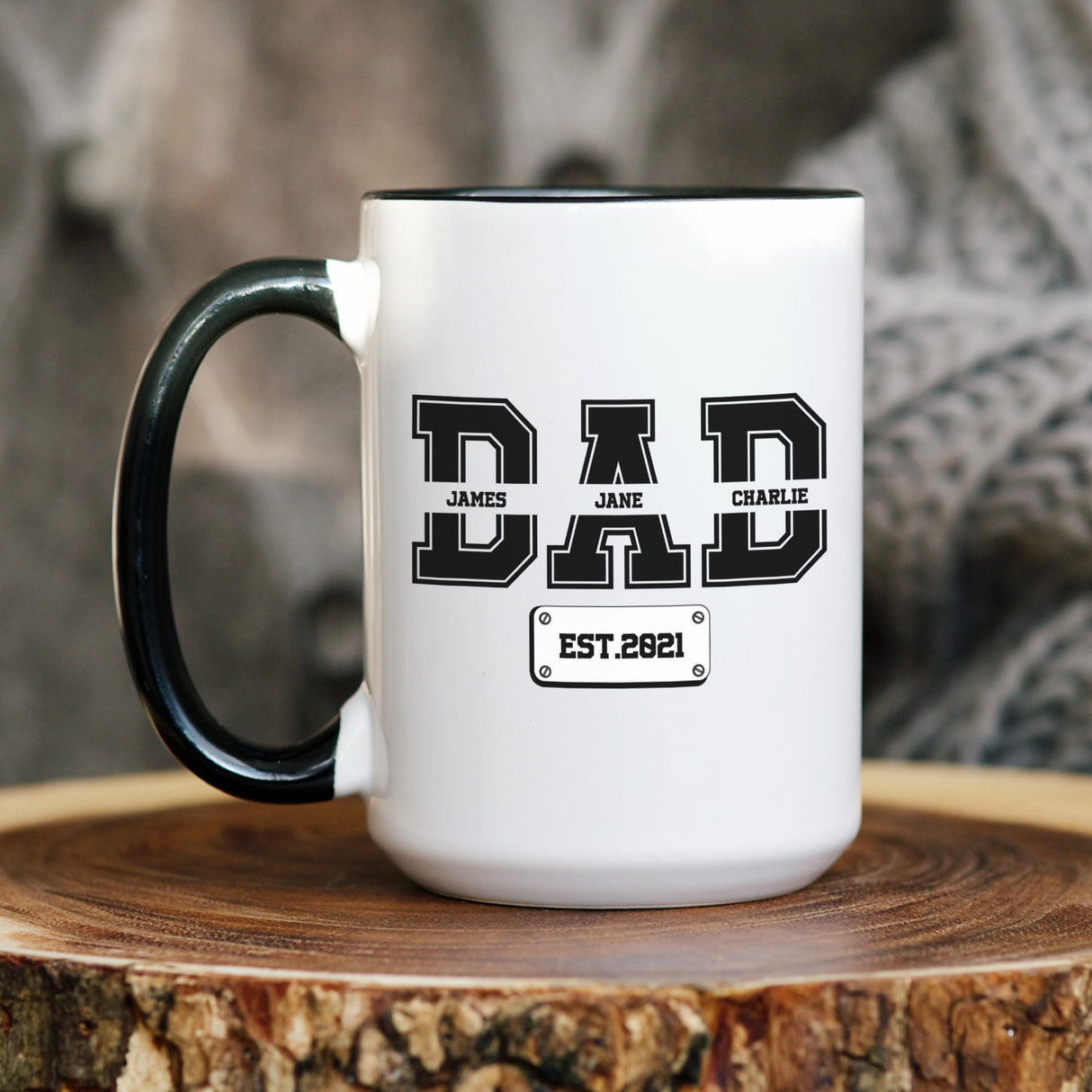 Personalized coffee mug for Dad featuring kid's names in varsity style font. Custom Father’s Day gift idea for him, great for new dads, stepdads, and grandpas.