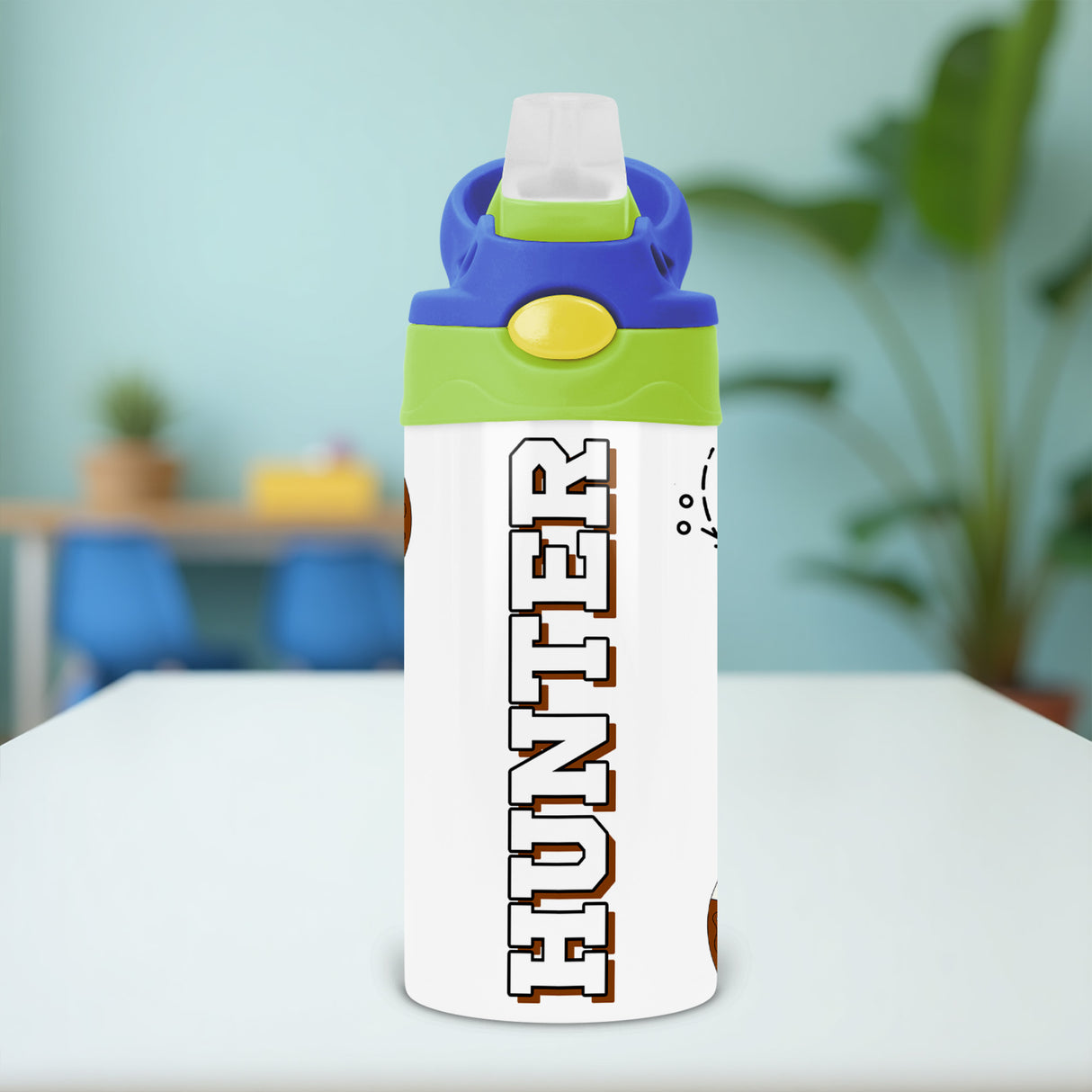 The football-themed sippy cup is ideal for toddlers to use at school. This kids back-to-school tumbler features a custom football design and name.