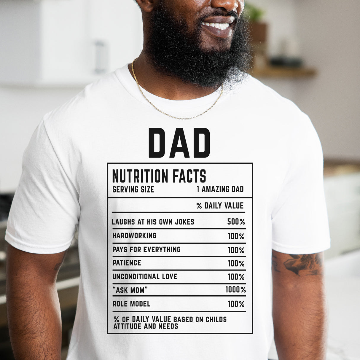 White custom Dad Nutrition Facts shirt featuring a funny joke graphic and personalized traits. Perfect for Fathers Day gifts.