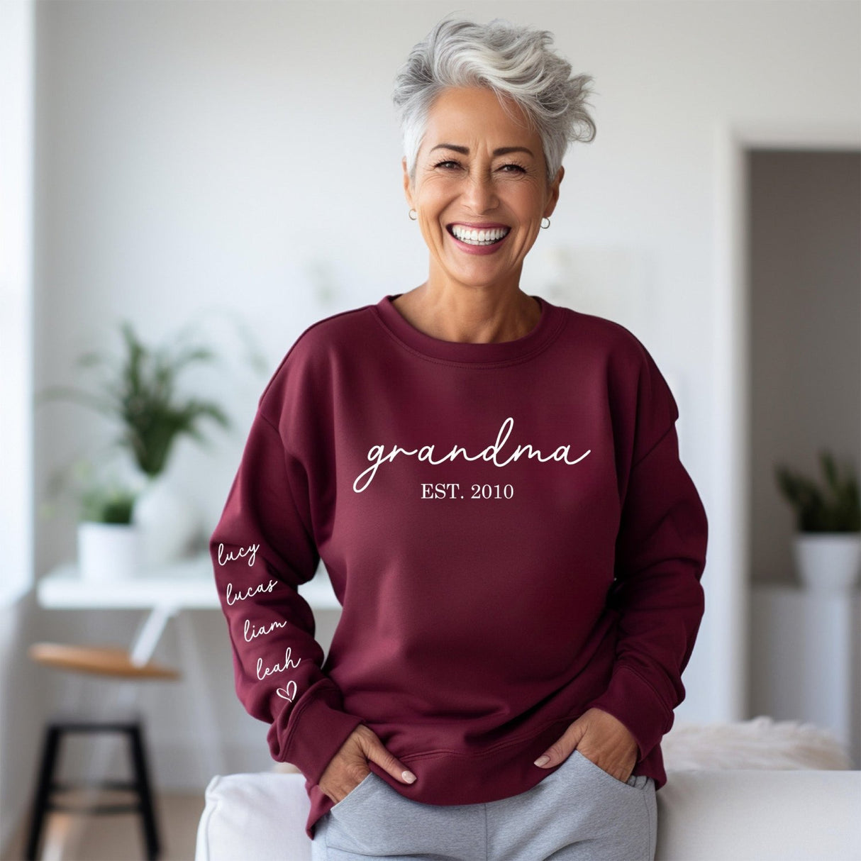 Personalized crewneck for grandma with children’s names, sentimental gift idea.