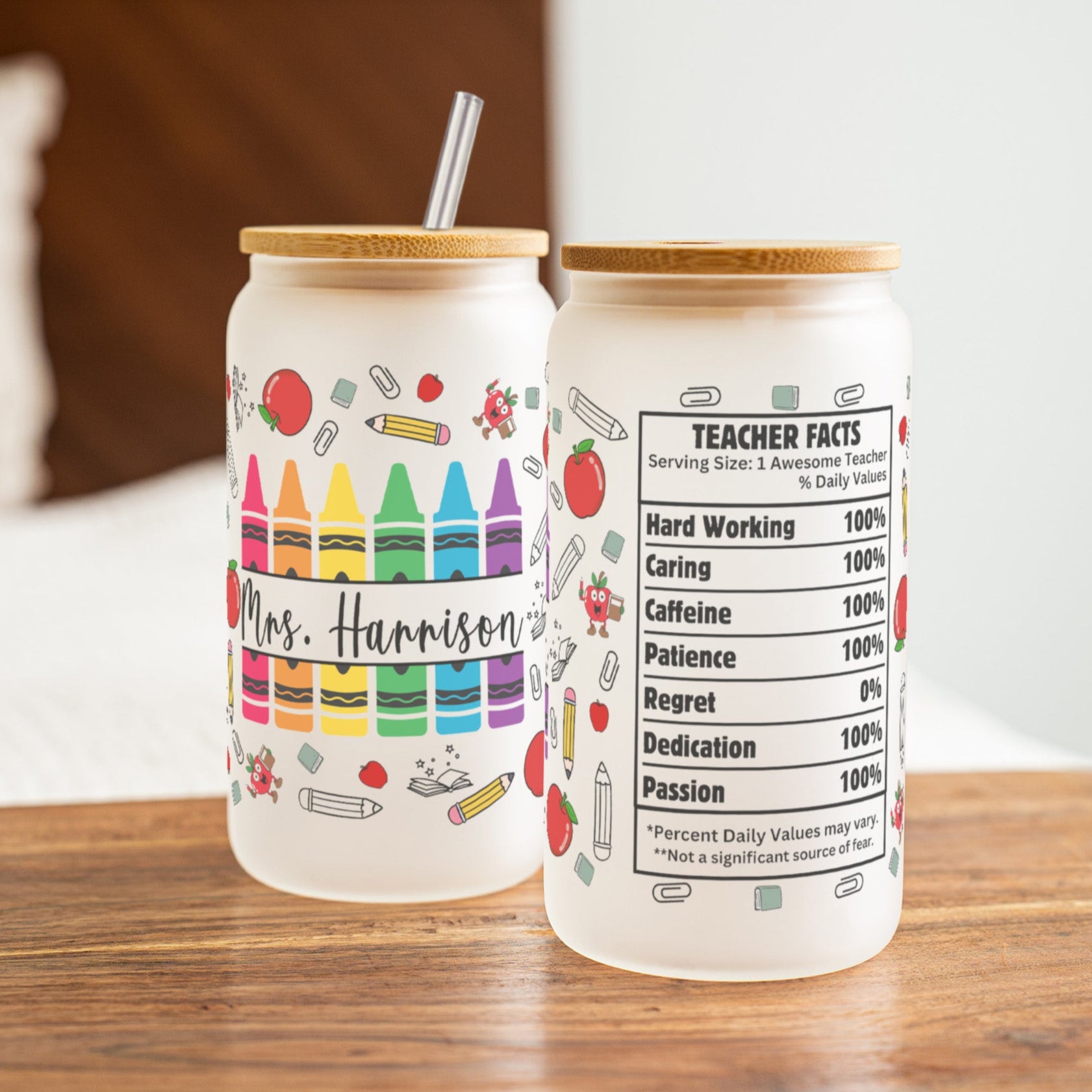 Personalized frosted glass teacher tumbler with crayon design and custom name, bamboo lid and straw.