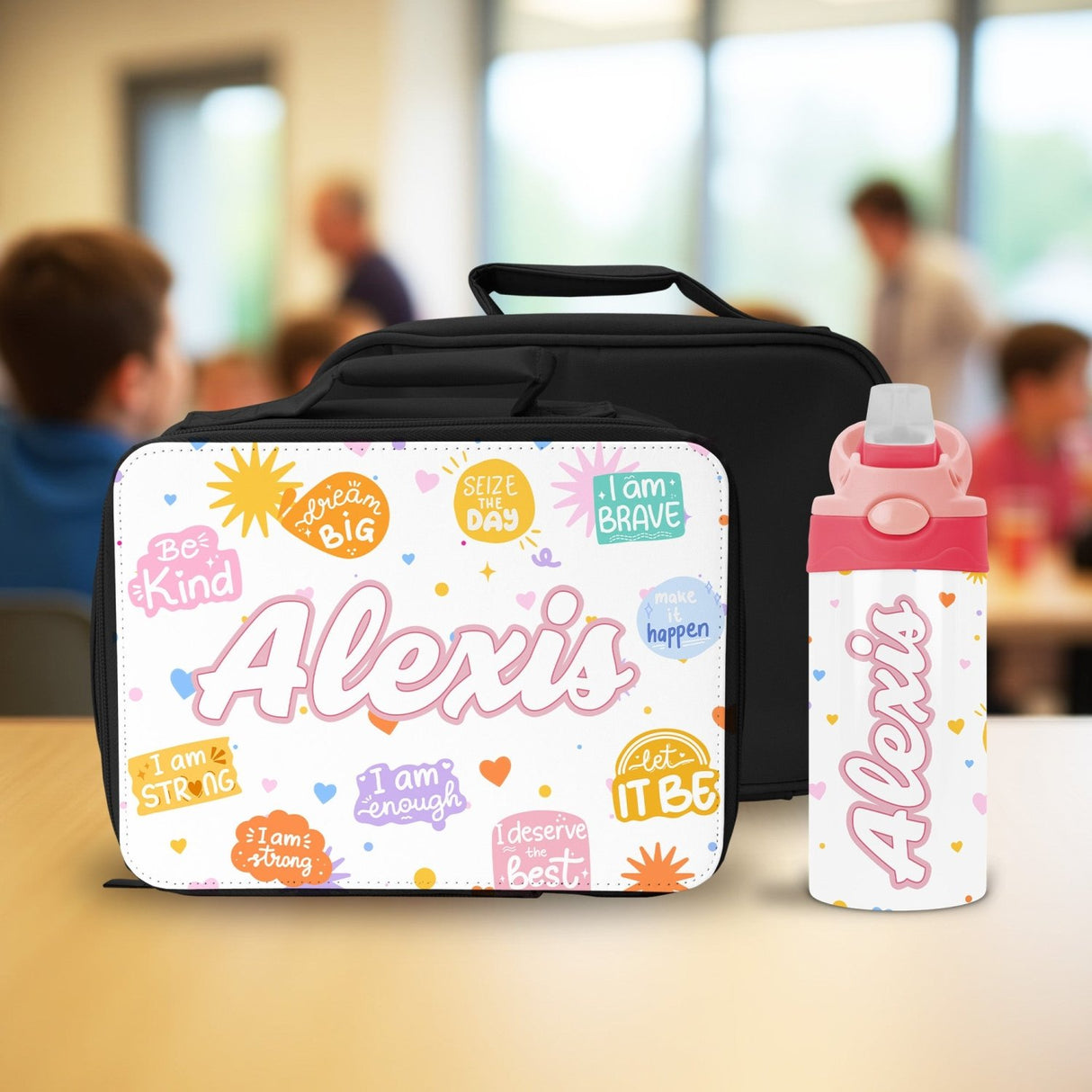 A custom lunch box and water bottle set that combines positive affirmations with practical design for school girls.