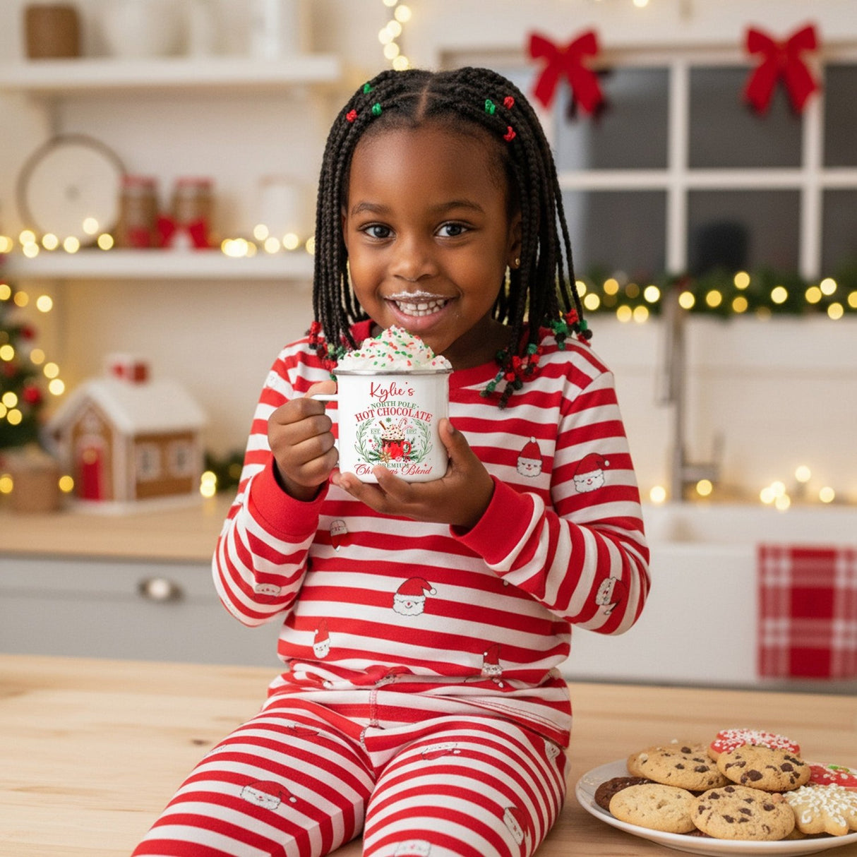 Cute personalized Christmas mugs for kids and adults with name and north pole hot chocolate design.