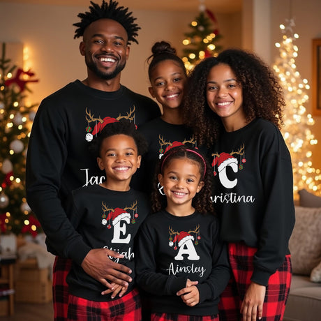 Custom family matching Christmas sweaters. Reindeer initial sweatshirts for Christmas for the entire family. Sizes available from newborn to 5XL.