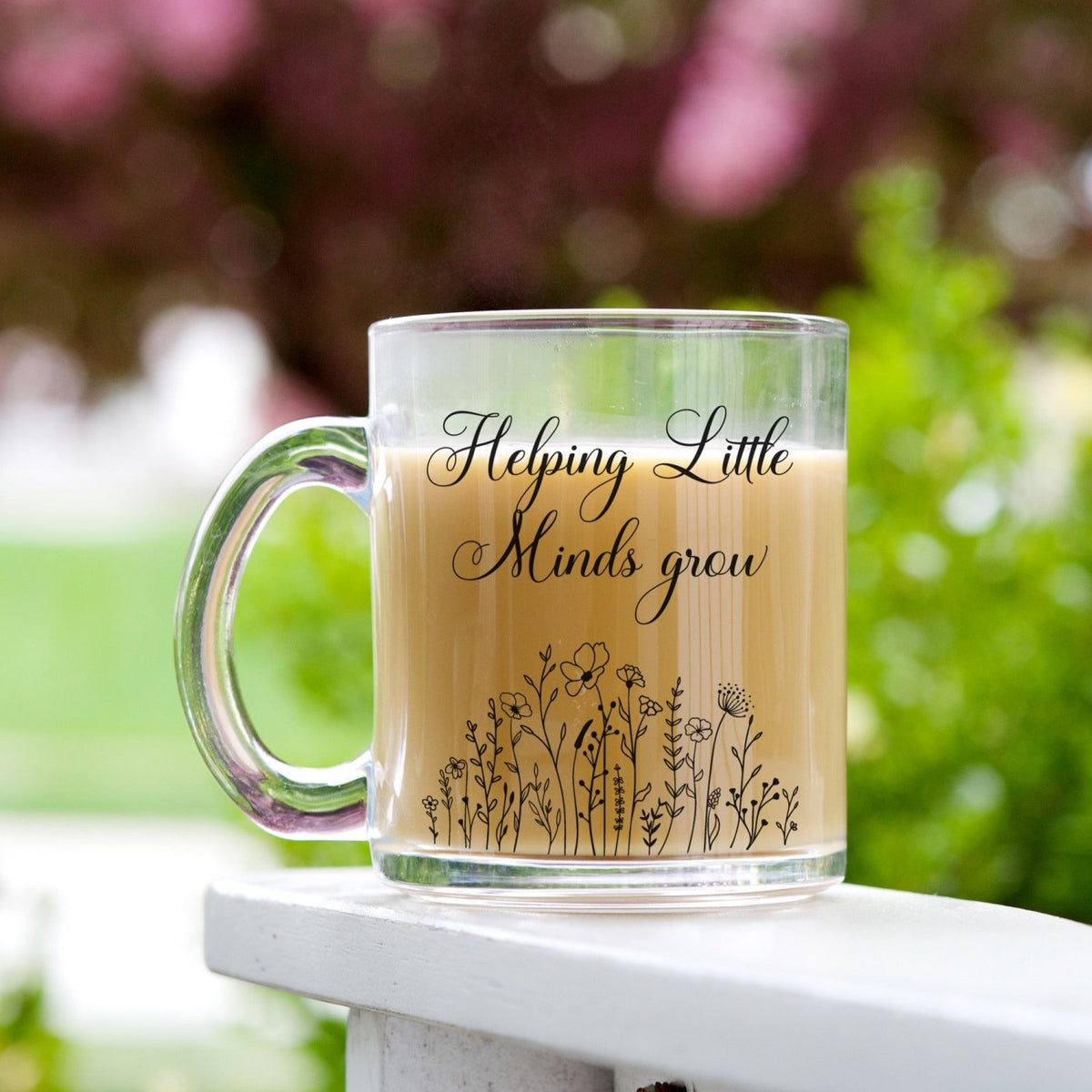Cute floral iced coffee cups for teacher. Helping little minds grow coffee cup for teachers. teacher appreciation gift ideas.