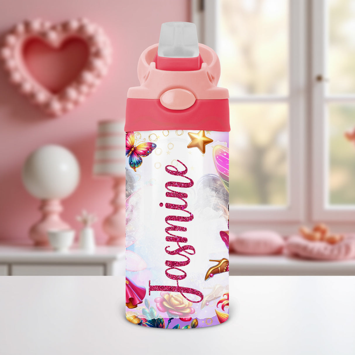 Personalized fairy water bottle with name shown with a flip top lid, perfect for kids to use at school or daycare.