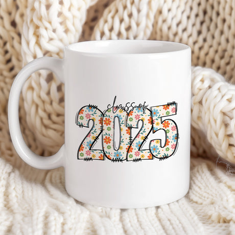 Graduation gift mug for women with colorful flowers and Class of 2025. design. Stylish graduation mug with floral accents.