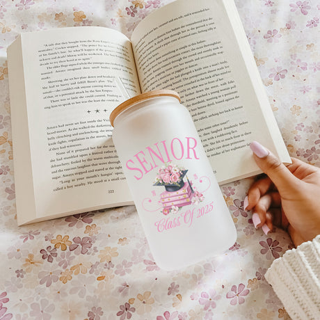 Class of 2025 graduation keepsake iced coffee glass for her, with bamboo lid and plastic straw. Floral graduation drinkware for women, personalized iced coffee glass for Class of 2025 graduates.
