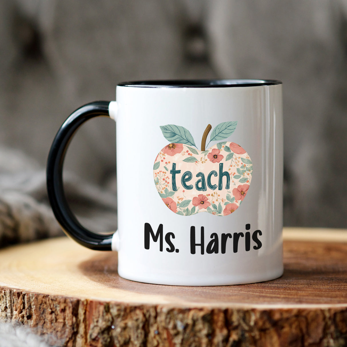 Personalized teacher mug with floral boho apple design. Custom name mug for teachers. Bright boho flowers surround the apple. Ceramic coffee mug for teacher appreciation gifts. Unique and trendy gift idea for teachers.