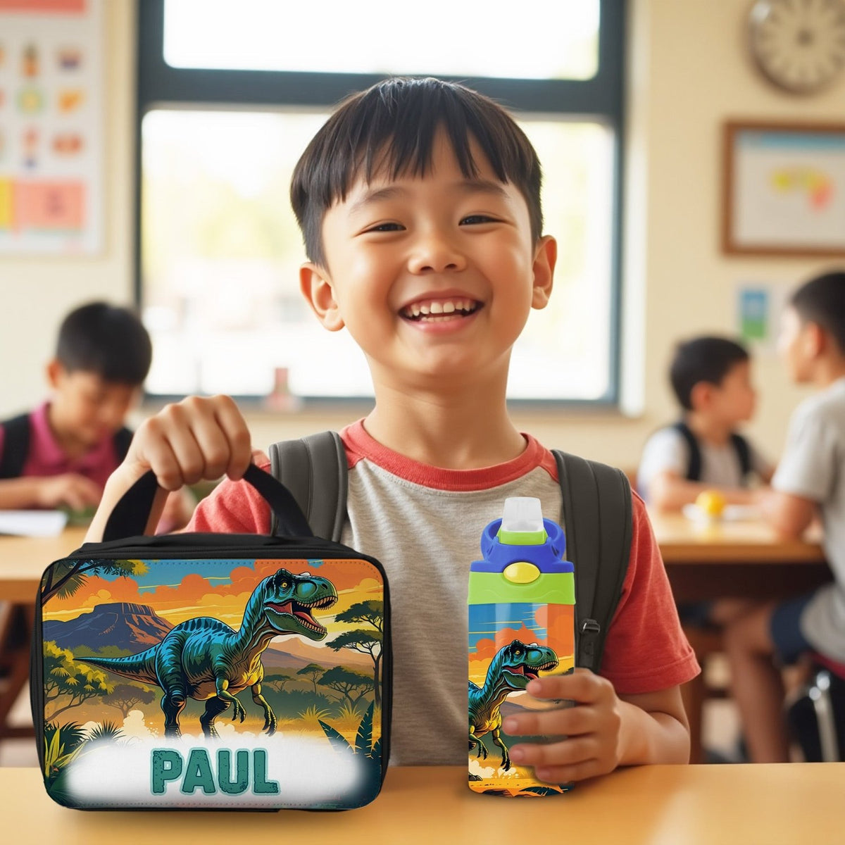 The perfect first day of school lunch tote and tumbler with name for dinosaur loving kids.