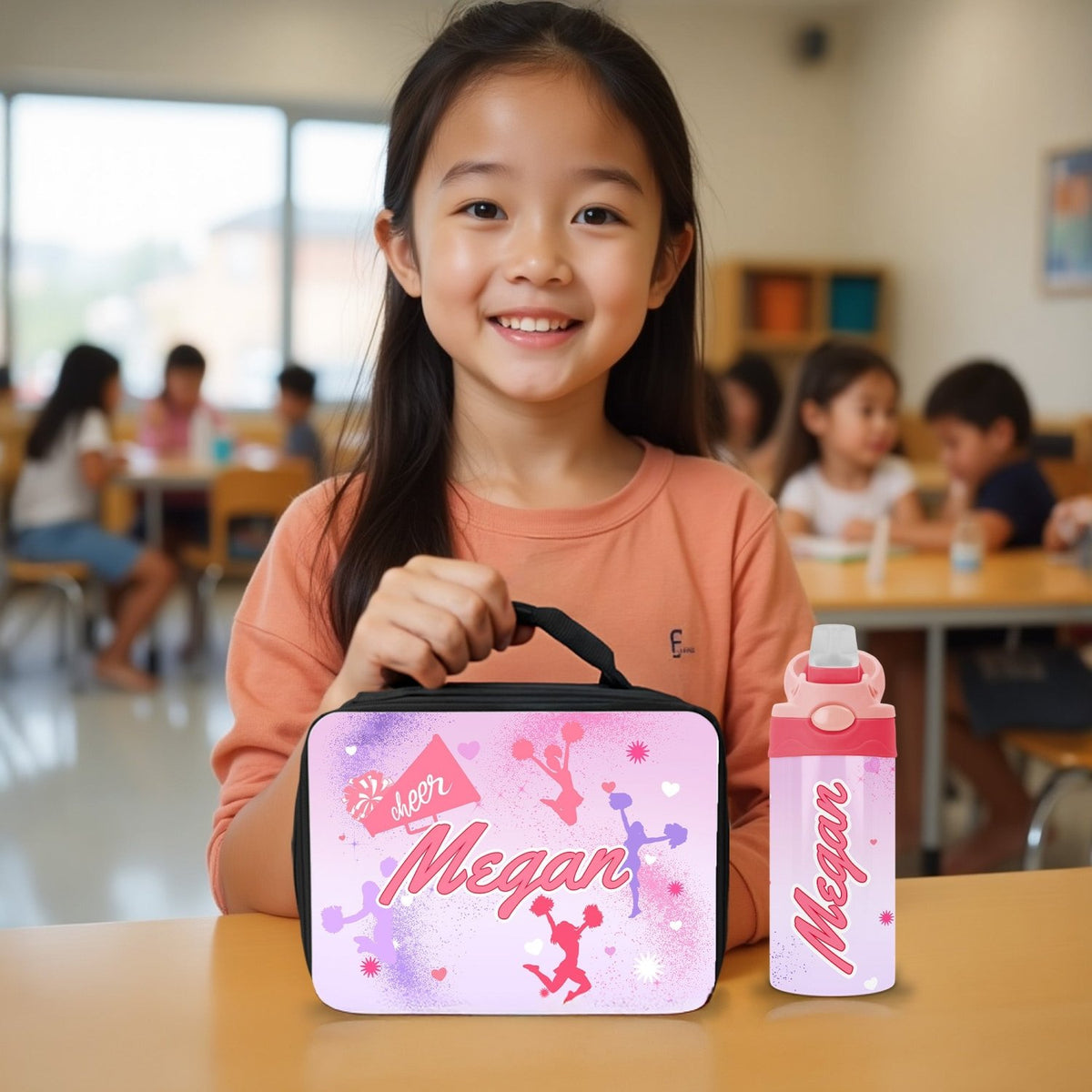 Cute first day of school lunch box with custom name and water bottle for girls.