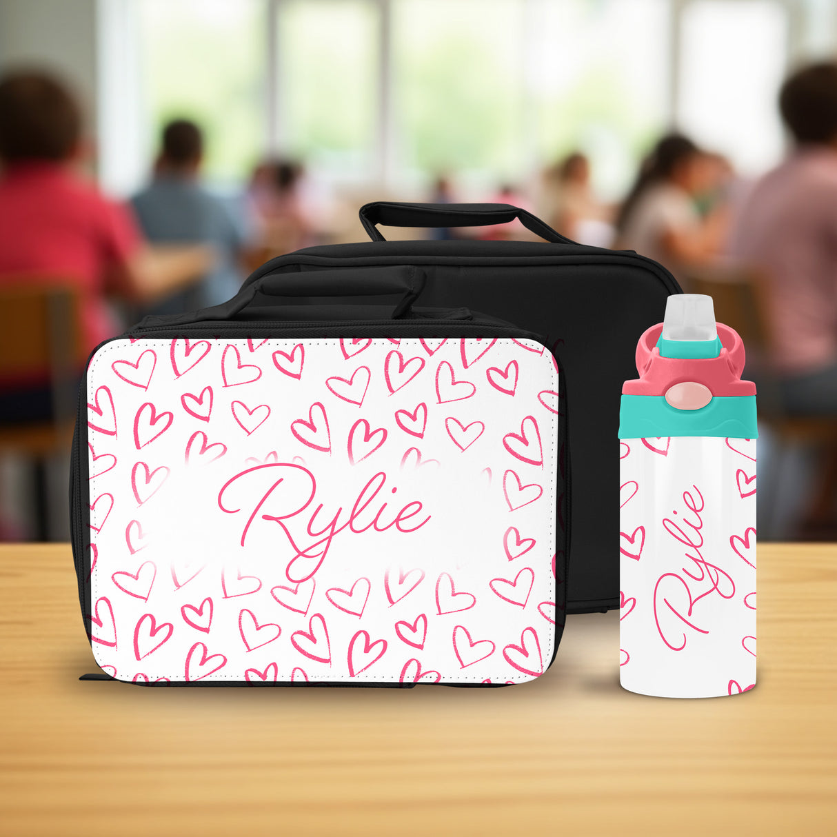 The perfect custom lunch box and water bottle for kids, this pink set with name is great for school, daycare, or weekend outings.