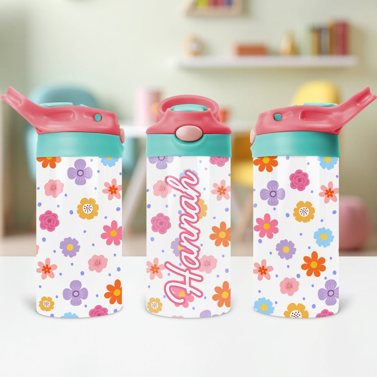Back-to-school floral water bottle with name. The perfect pink sippy tumbler gift for little girls.