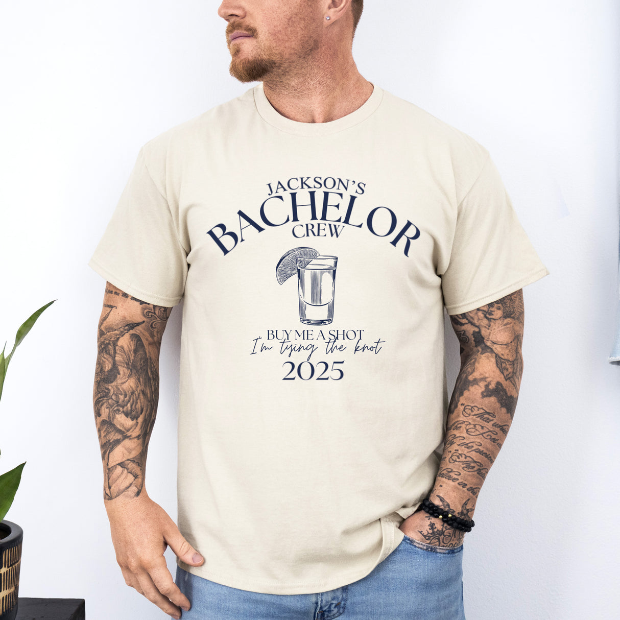 Personalized groom and groomsmen shirts are the perfect gift for him from the wedding party, ready for group photos and fun.