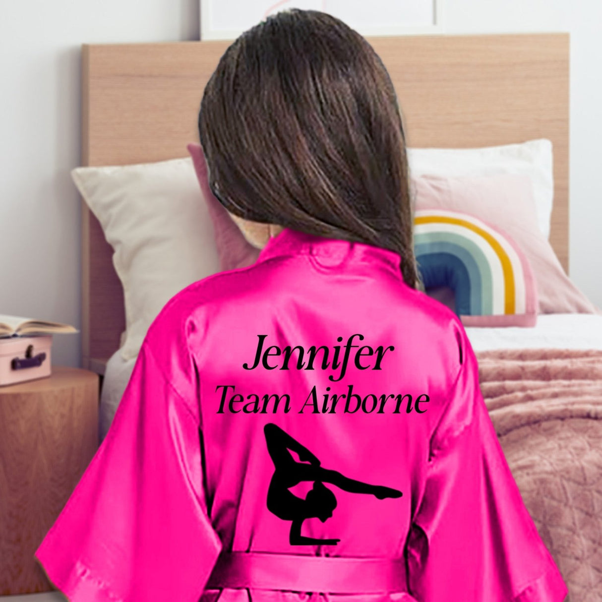 Matching dancer robes for girls with personalized names, ideal for dance team gifts, studio photos, or performances.