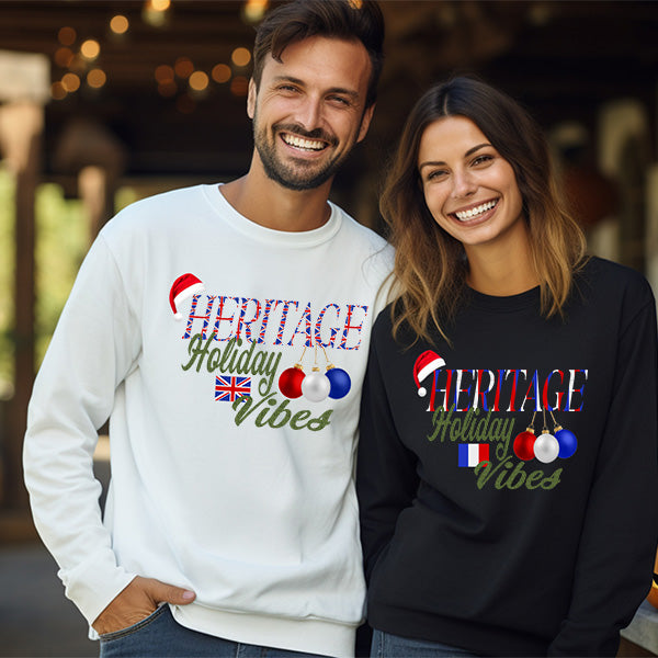 Couple wearing their County Heritage Holiday sweatshirts. One has a France Christmas shirt and the other a United Kingdom Christmas shirt. all SKUs