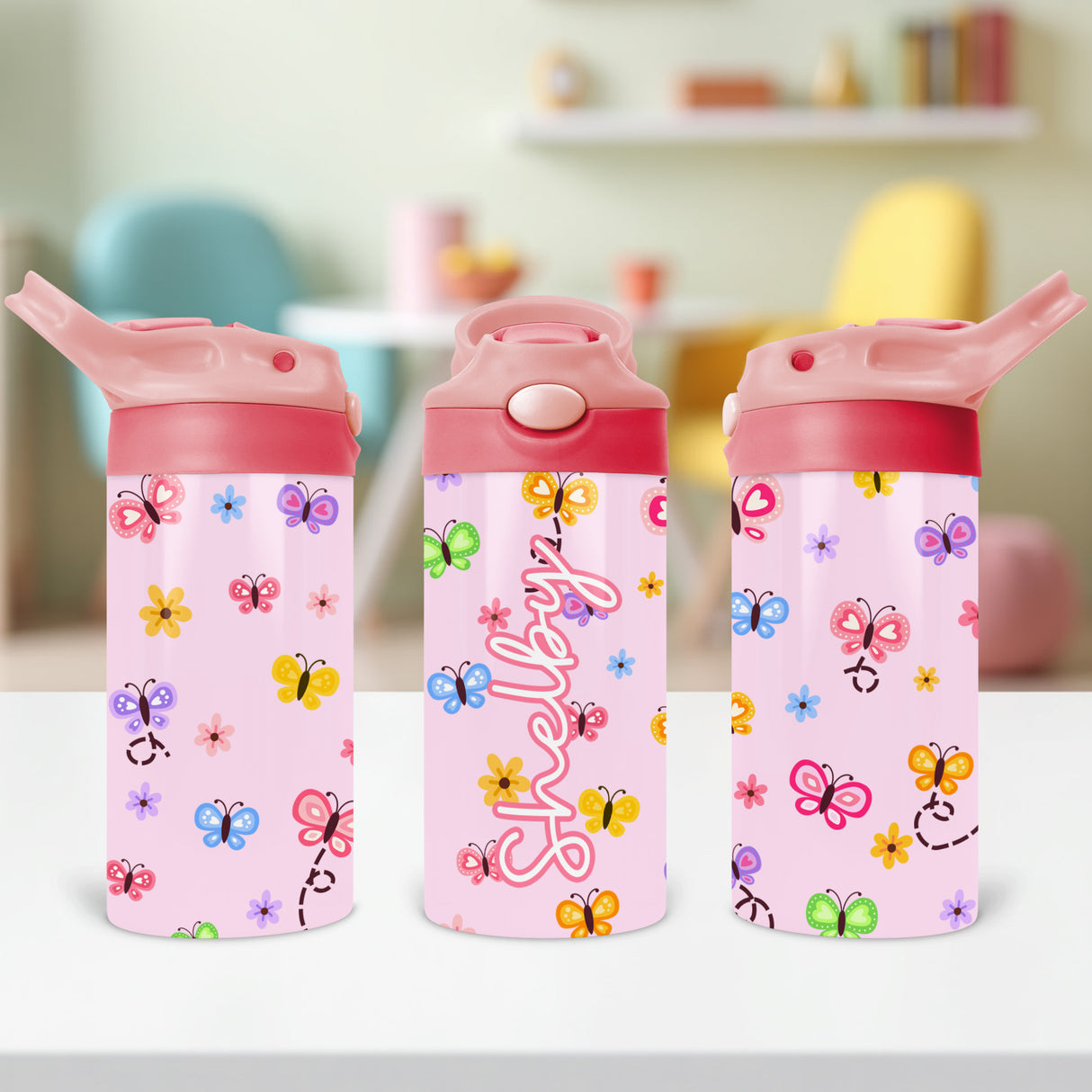 Custom name water bottle for girls with butterflies, great for toddlers and school-aged kids, perfect back to school gift.