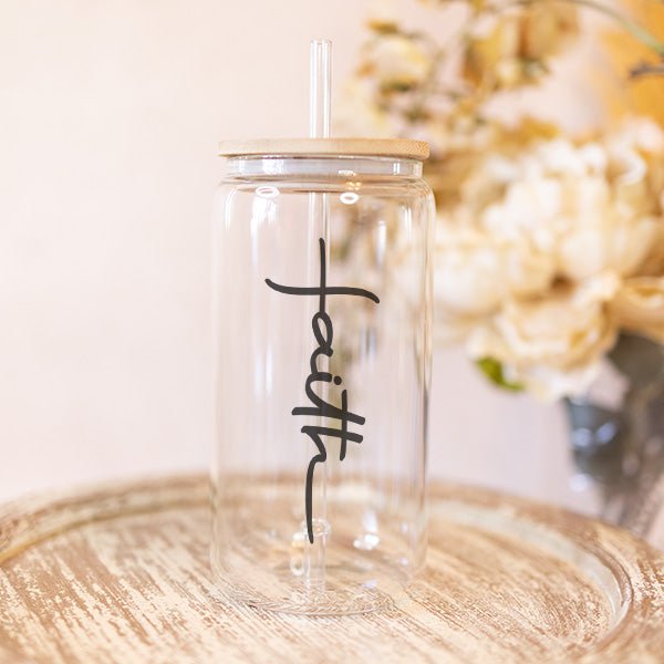 Iced Coffee Cup with the word Faith written vertically. It offers a minimalistic design. Gift for Christians or as a motivational or encouraging gift.