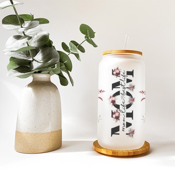 A frosted floral iced coffee cup designed as a gift of motherhood for mom. A perfect gift for her from son or daughter.