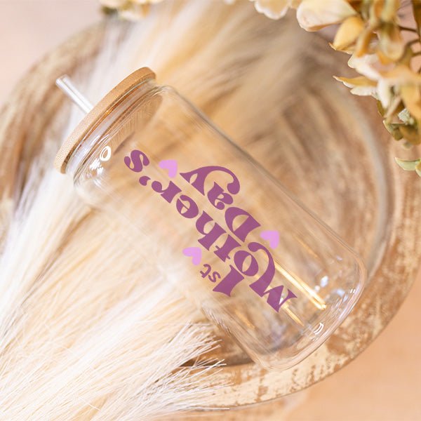 This iced coffee glass can has printed text of 1st Mothers Day for new mom. It's a cute gift that can be used to acknowledge your wife, daughter, sister or friend first Mother's Day.