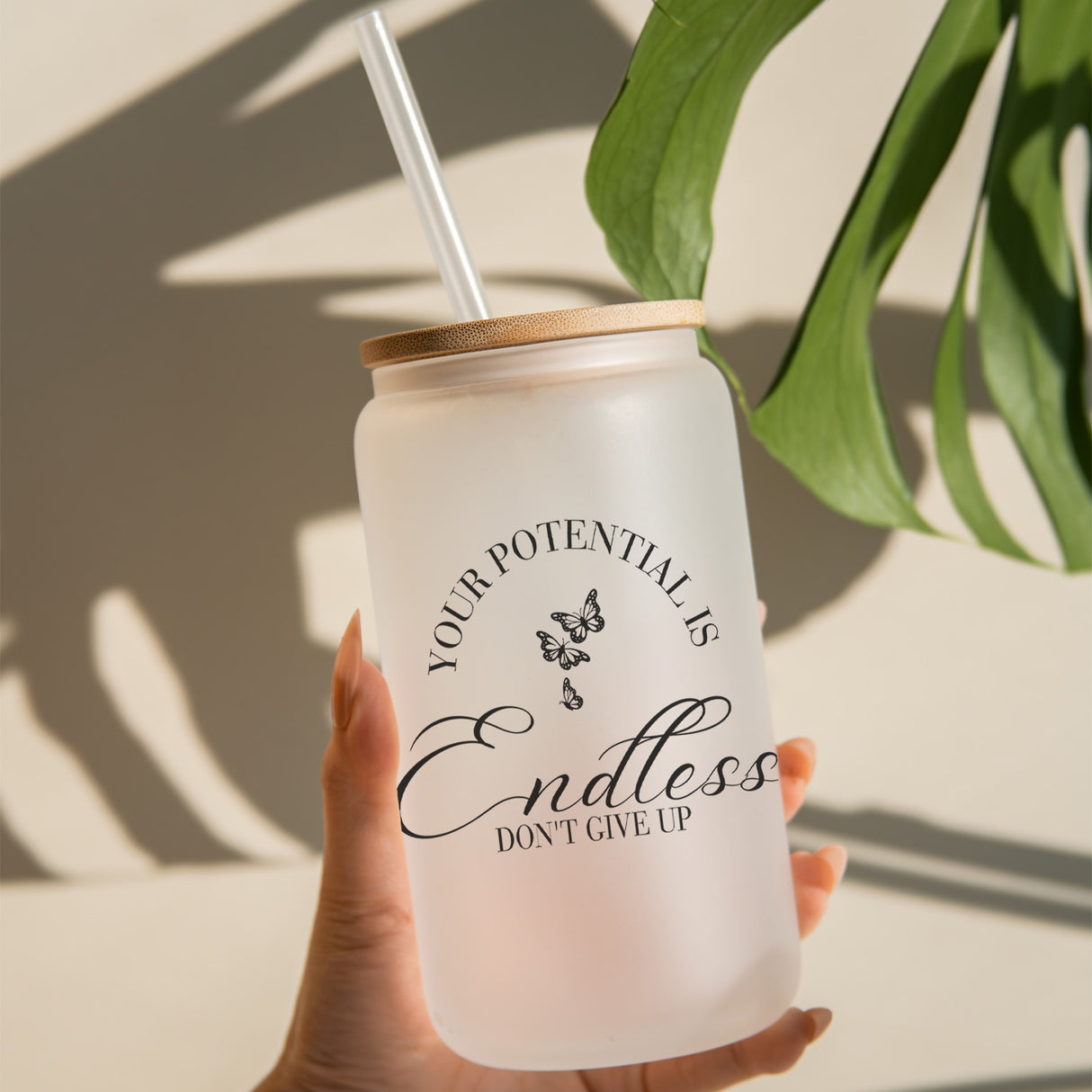Frosted glass can with the phrase your potential is endless, don't give up.  Inspirational gift for college student, new graduate etc.