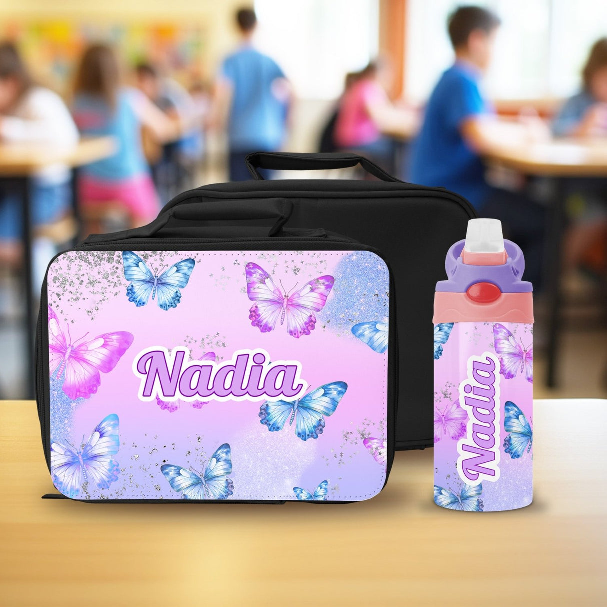 Custom insulated lunch box with name and matching water bottle for kids, perfect personalized back to school gift.