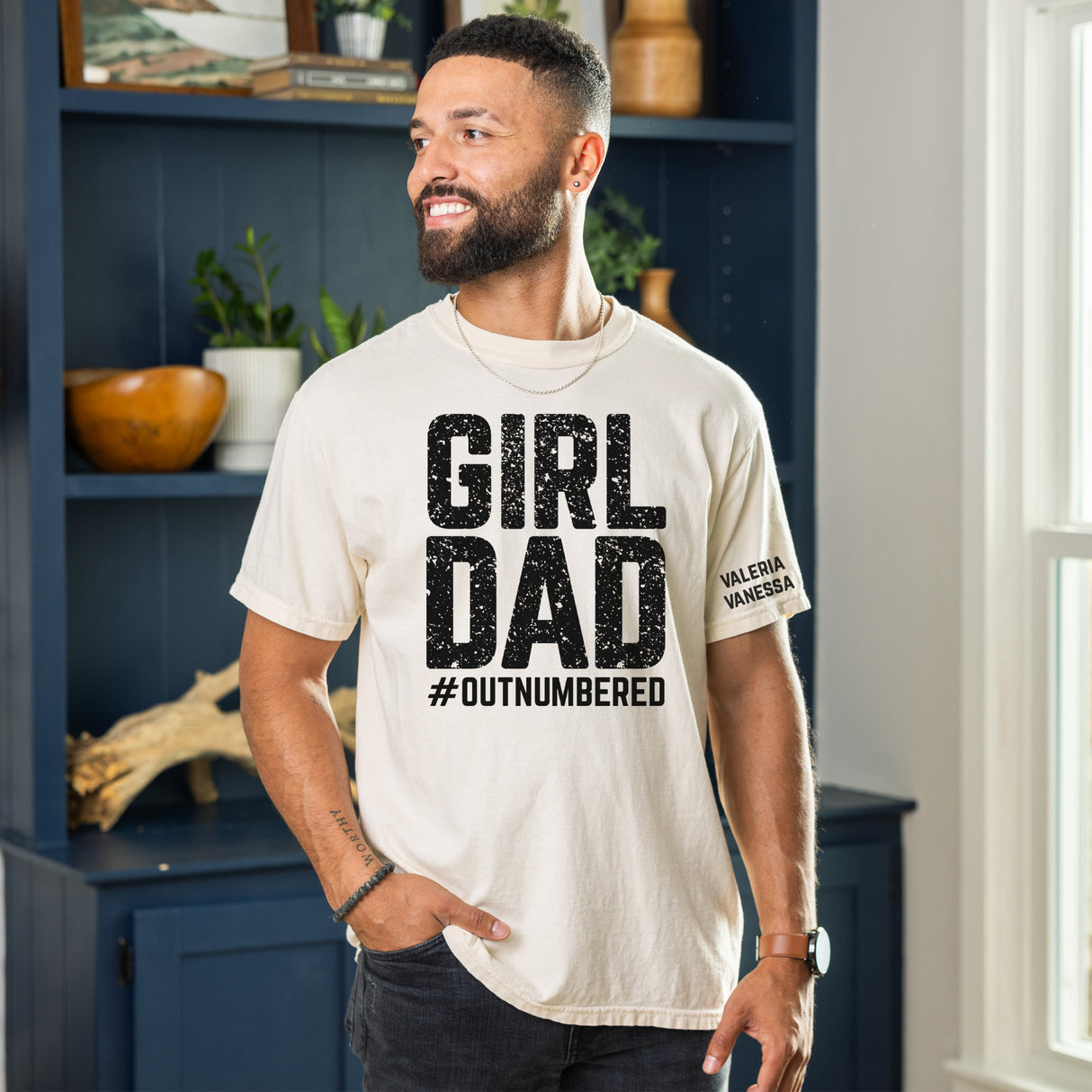Ivory unique girl dad t-shirt with custom name print, perfect gift idea for dads outnumbered by daughters on Father’s Day.