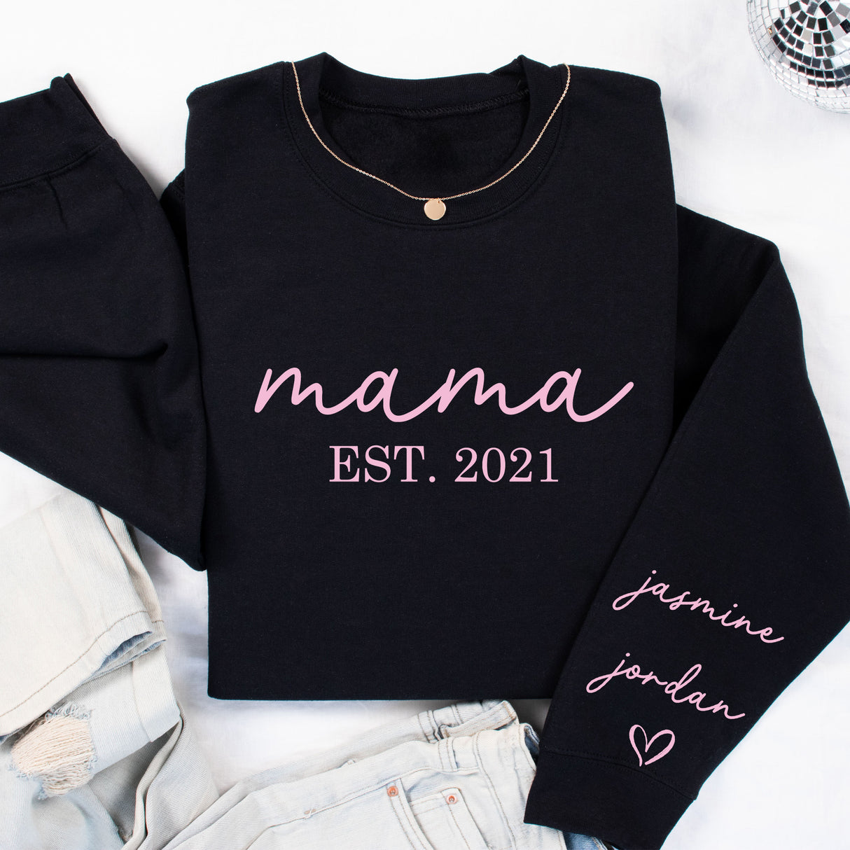 Soft and stylish with a cursive font sweatshirt for moms, personalized with kids' names and the year of becoming a mother.