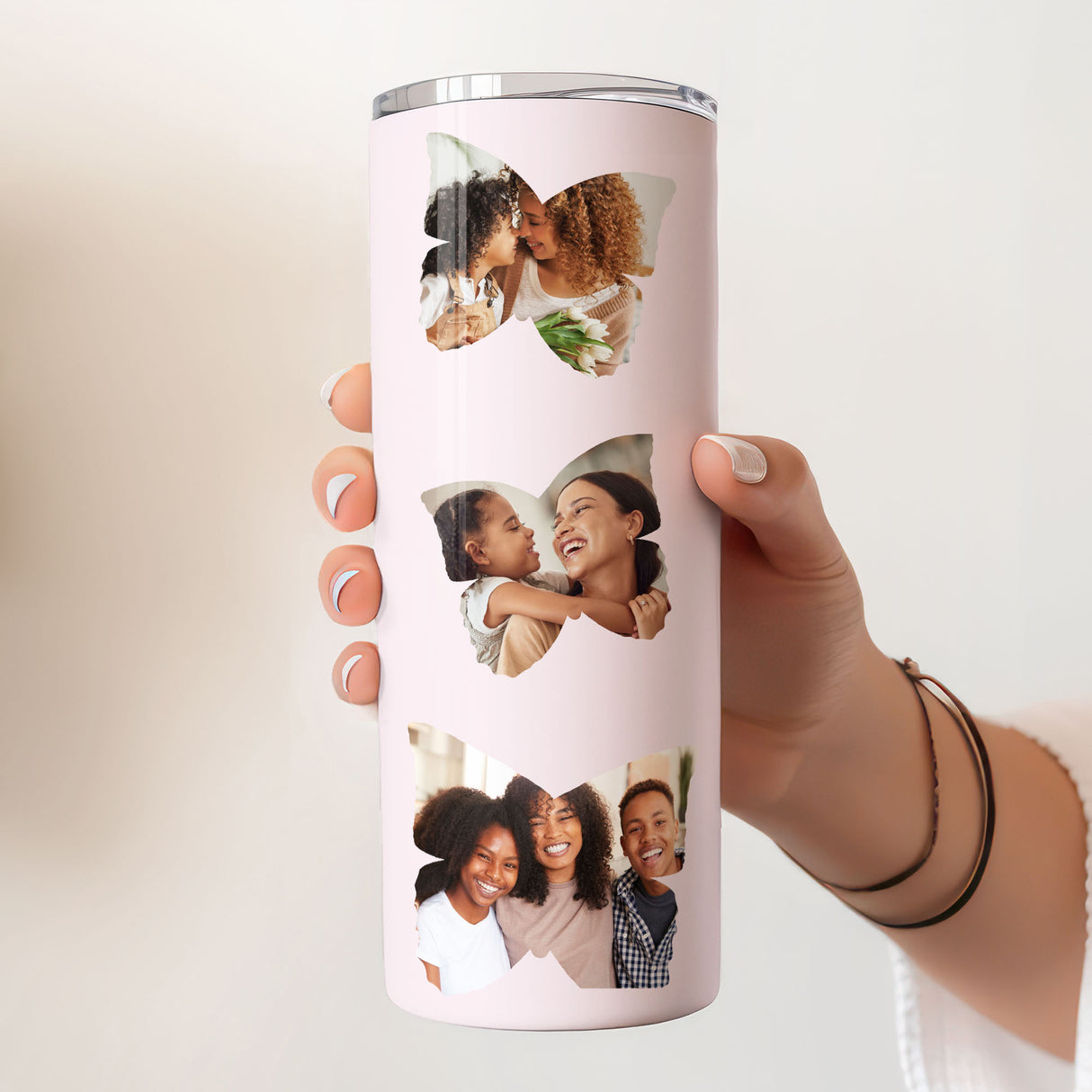 Floral photo tumbler with butterfly accents, customized for mom, perfect Mother’s Day or holiday gift.