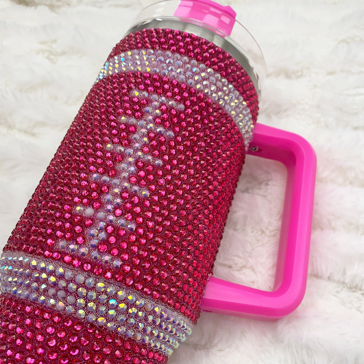 Close up of rhinestone tumbler with football applique. all SKUs