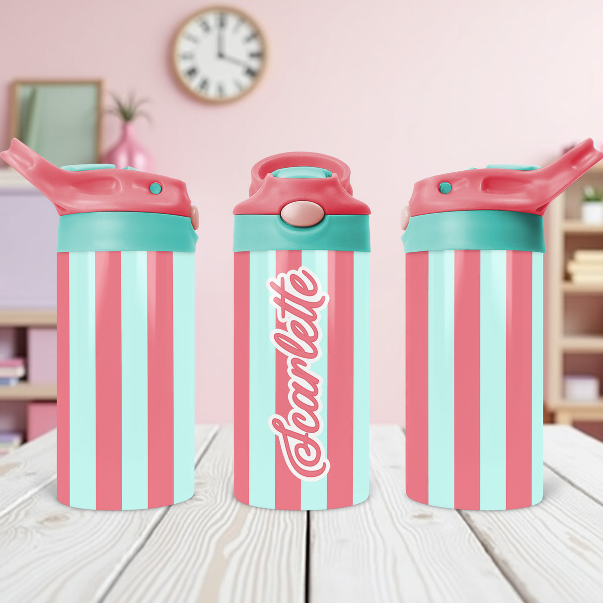 Durable custom kids water bottle featuring multicolor stripes and printed name for everyday use.