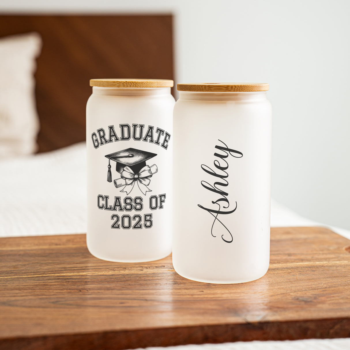 Frosted glass tumbler for graduation. Reusable glass iced coffee tumbler with custom Class of 2025, practical gift idea.