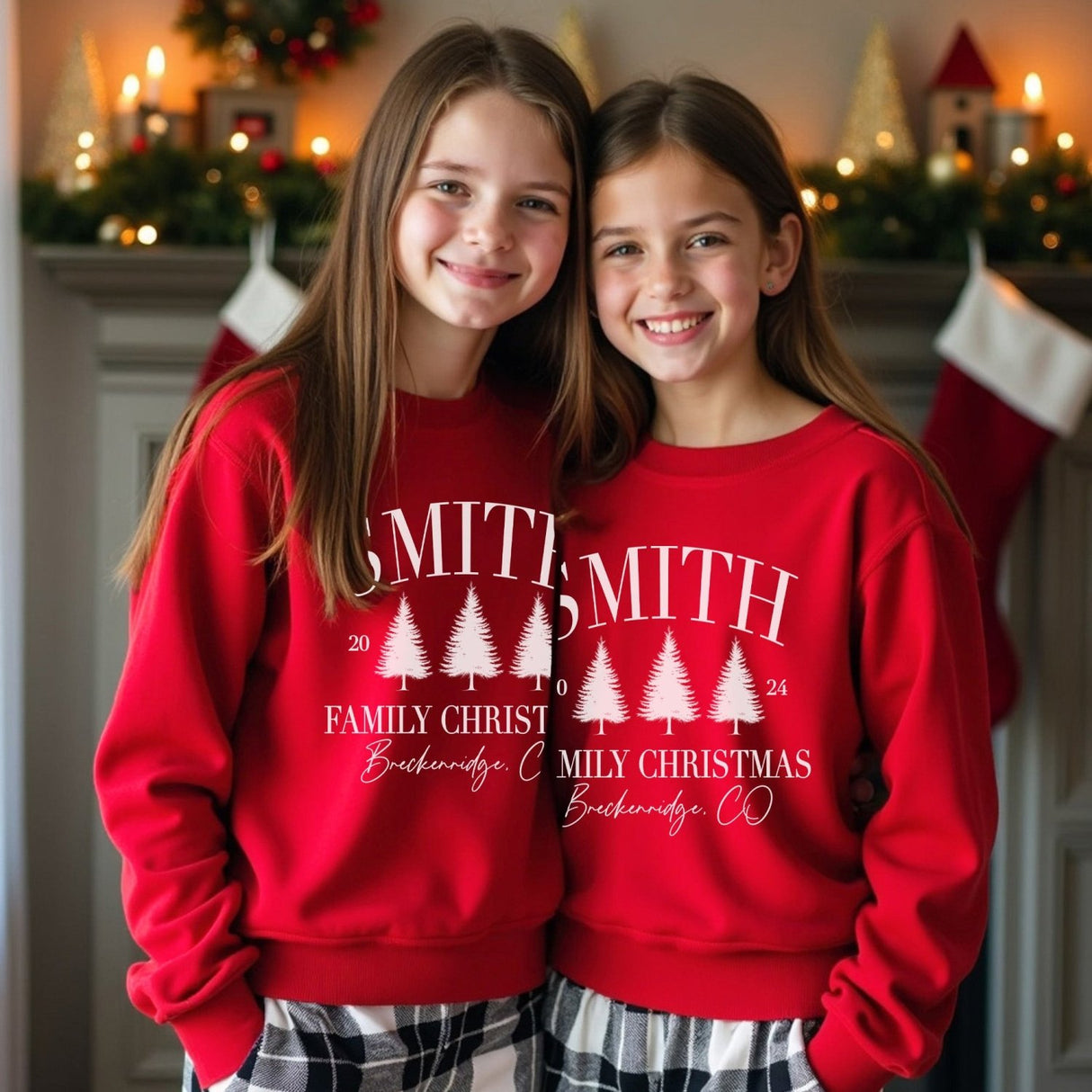 Cute red youth Christmas sweaters personalized with family last name.