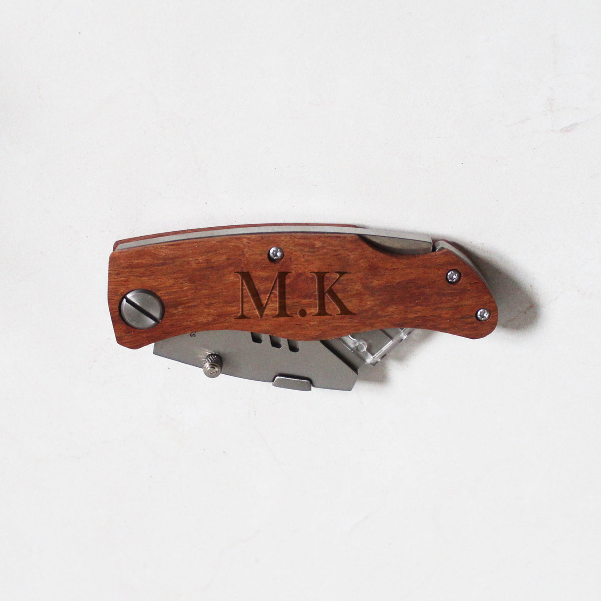 Engraved utility knife gift for dad, compact and durable multitool from kids.