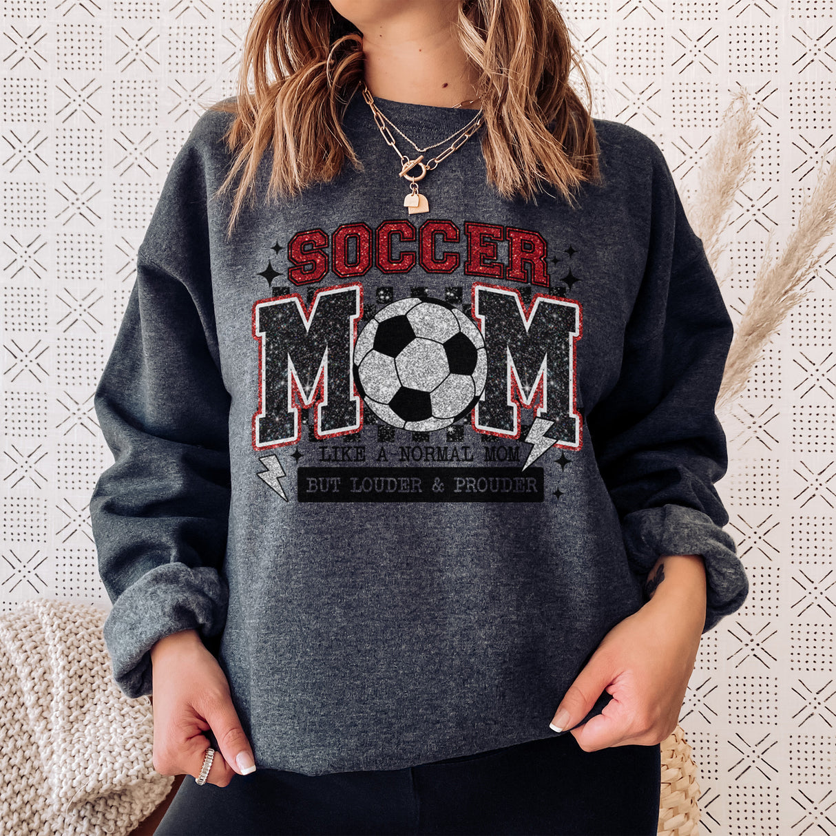 Soft crewneck sweatshirt with soccer mom design, ideal Mother’s Day gift for moms who love sports.