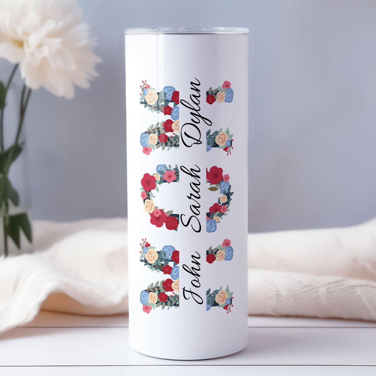 Personalized floral skinny tumbler for mom with kids names, custom insulated Mother’s Day gift, perfect for coffee or travel.