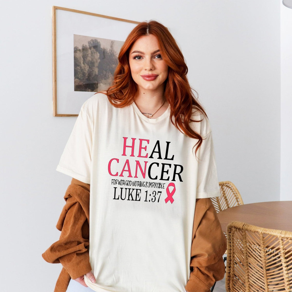 Faith-inspired T-shirt promoting hope and healing for breast cancer fighters and survivors.