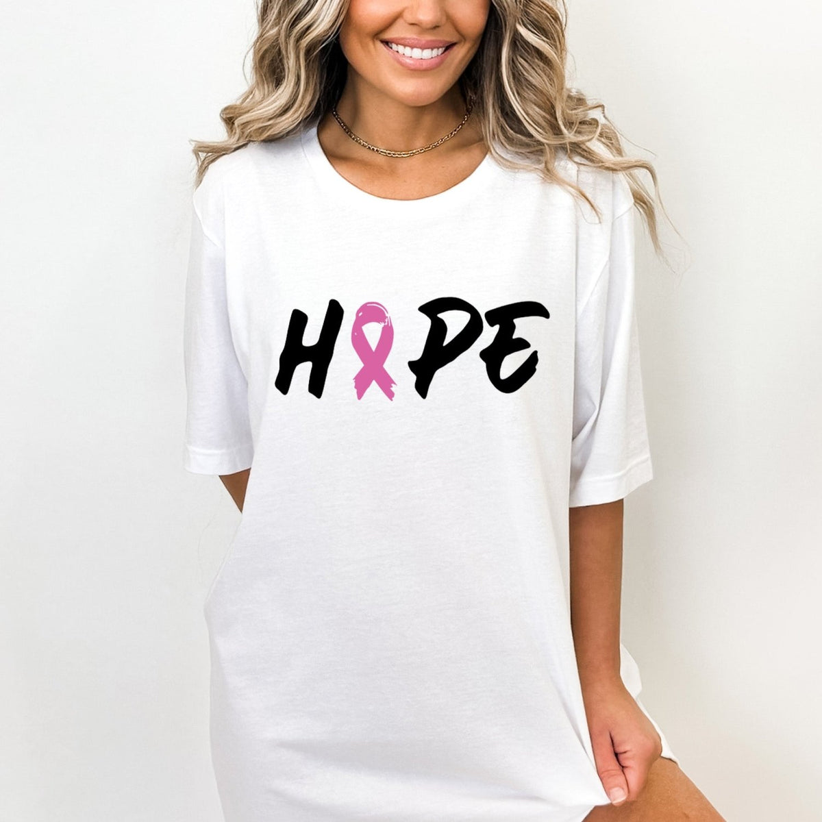 Celebrate Breast Cancer Awareness Month with a minimalist tee centered on the message of hope.