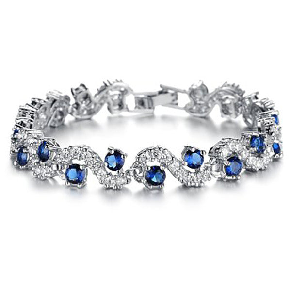 Elegant blue sapphire bracelet for women with platinum plated finish and Swarovski elements, perfect gift for her.