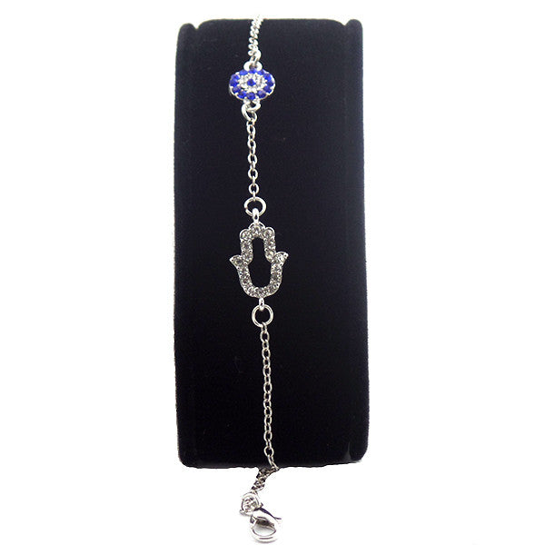 Blue evil eye charm bracelet in silver, designed for spiritual protection and makes a thoughtful gift for a bride, best friend, or sister.
