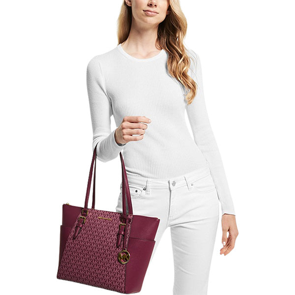Model holding Charlotte Tote Bag, Mulberry
