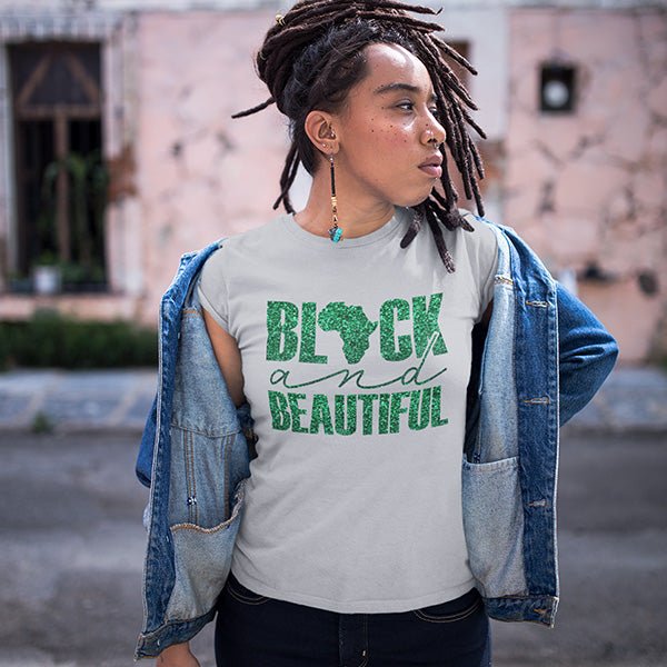 Black and Beautiful Shirts that are available as tshirts, hoodies, sweatshirts, tank tops, crop tops and more. Great Black History Month Shirt or Juneteenth Shirt but can be worn any day of the year. Its the perfect Black Girl Magic shirt.
